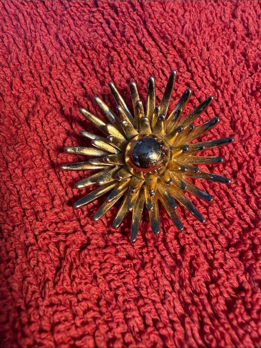 Monet Gold Sunburst Brooch with Gold Tone Center